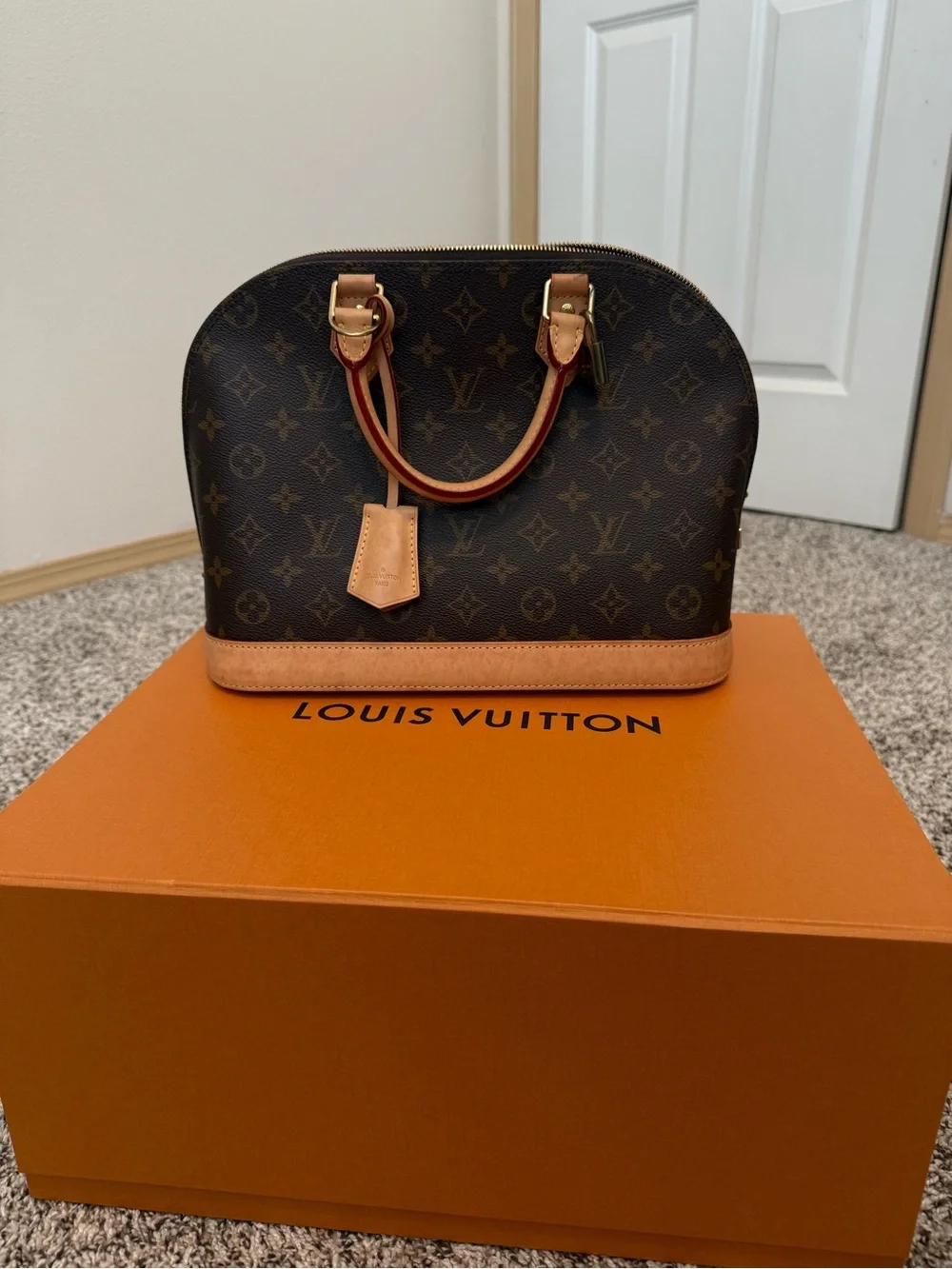 Louis Vuitton Monogram Alma Handbag in Brown and Tan